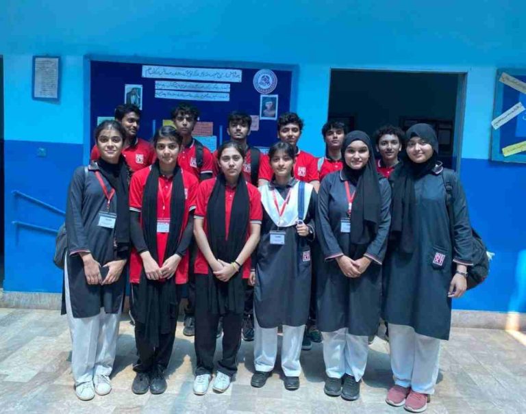 Group photo of The Next School students at Sikanderabad School during a community activity day, smiling and enjoying the learning experience.