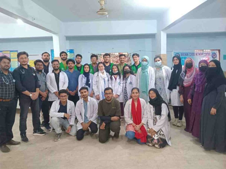 Group photo of all doctors and the Baithak School Gulbahar Campus team at the free medical camp, showcasing the healthcare and education collaboration.