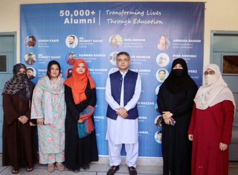 Group photo of Mr. Jibran Baloch, Ms. Asma Faiz, and training participants at the Master Training Workshop.