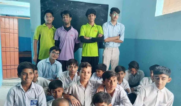 Group photo of Head Start School and Baithak School students during the CCDP activity day at Qaid-e-Azam Colony Campus.