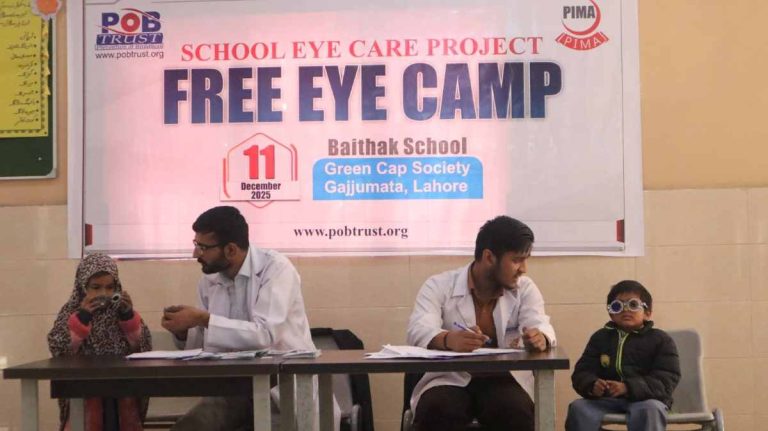 PIMA medical team providing eye screening services to students at Baithak School.