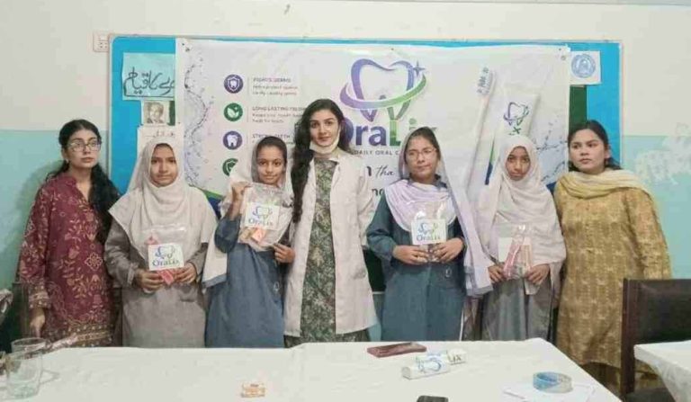 Students of Baithak School Network with Dentist Natasha Maheshwari during an oral health awareness initiative.